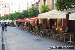 Street of restaurants, Seville, Spain, 2024