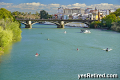 Kayaks, Iron Bridge on river, Seville, Spain, 2024
